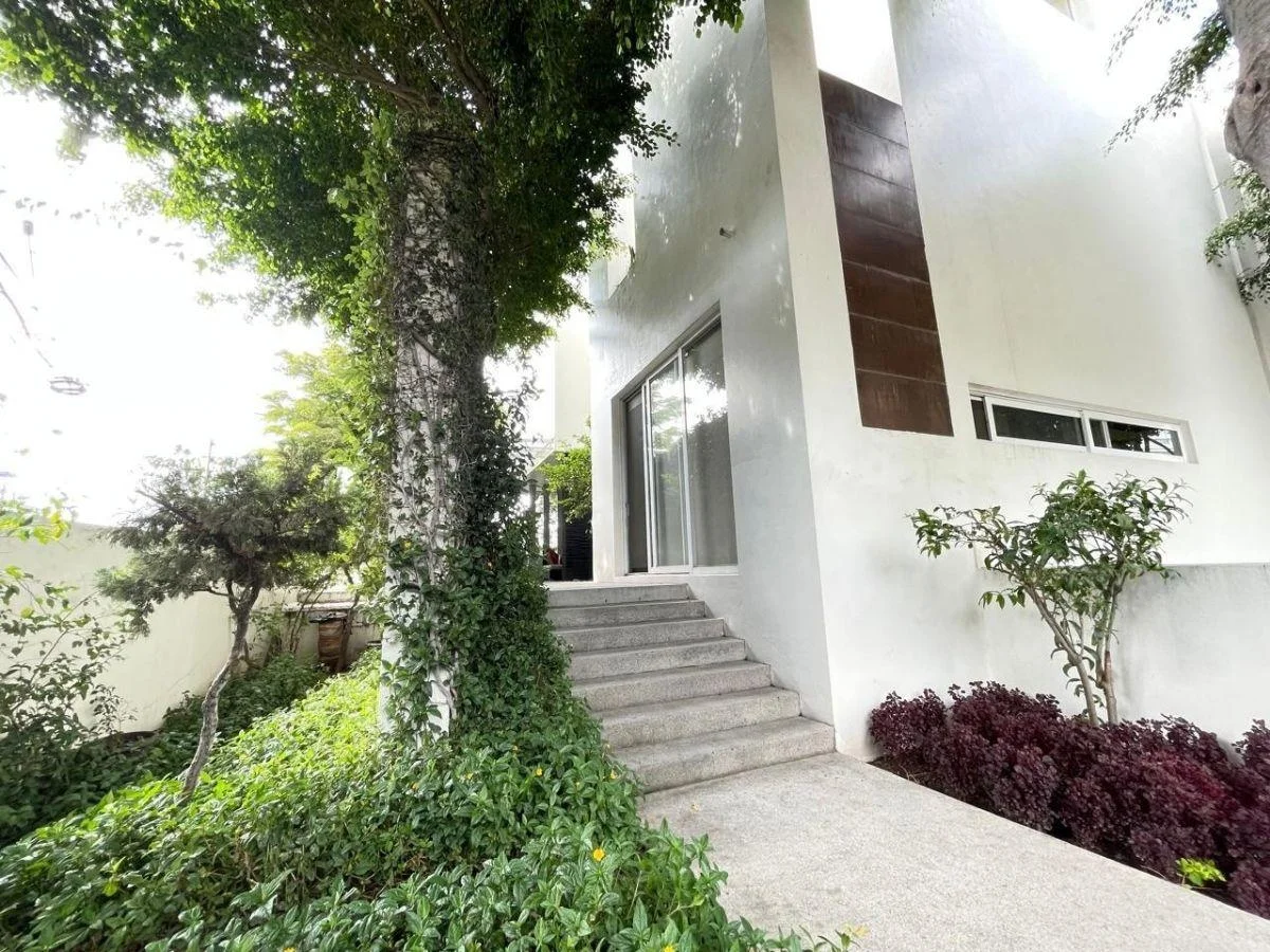 Una casa abierta al verde